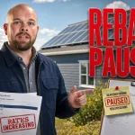 Ray explains the PEI solar rebate pause for 2026 beside rooftop solar panels and a utility bill