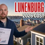 Ray-style solar advisor beside a Lunenburg coastal home with rooftop solar panels for the Lunenburg solar panels cost guide
