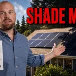 Solar Panels Coquitlam 2026: Cost, Rebates, Shade, Batteries and Quote Checklist Ray holding an electricity bill beside shaded rooftop solar panels for a Coquitlam solar guide